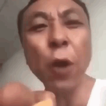Man In White Shirt Pointing Making Funny Face GIF