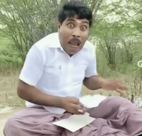 Man in White Shirt Purple Pants Mouth Open