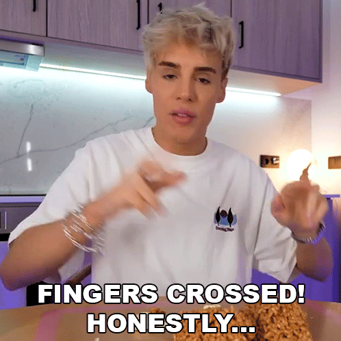 Man In White Shirt Saying Fingers Crossed GIF
