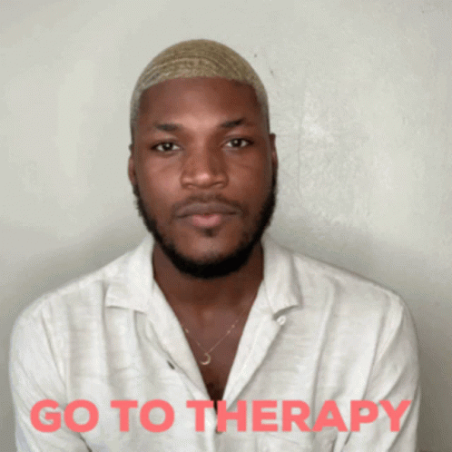 Man in White Shirt Saying Go to Therapy