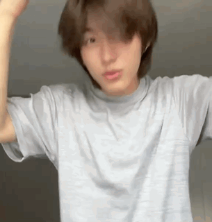 Man in White Shirt Saying I Love You Clapping