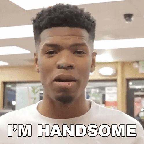 Man in White Shirt Saying Im Handsome
