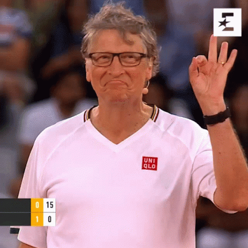 Man in White Shirt Saying Uniqlo