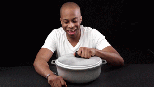 Man In White Shirt Smiling Opening Pot GIF