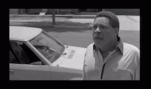 Man In White Shirt Standing By Car GIF