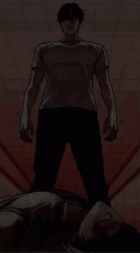 Man in White Shirt Standing Over Lying Man