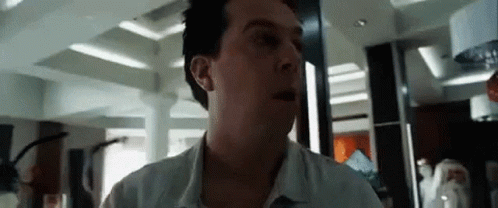 Man In White Shirt Standing GIF