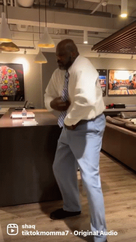 Man In White Shirt Tie Dancing With TikTokmoma7 GIF