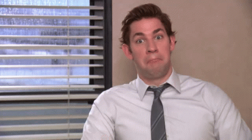 Man in White Shirt Tie Making Funny Face