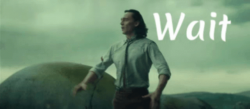 Man in White Shirt Tie Rock Saying Wait