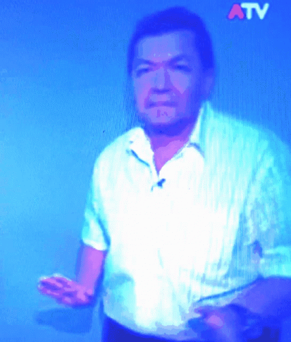 Man In White Shirt With ATV On Blue Background GIF