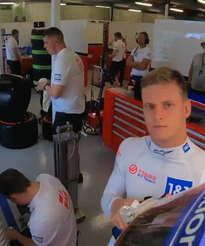 Man in White Shirt with Haas