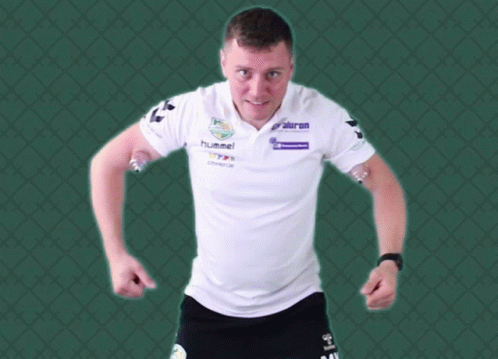 Man in White Shirt With Hummel