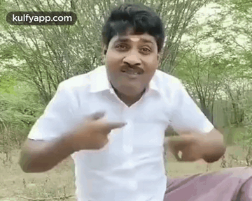 Man In White Shirt With Mustache Pointing At Camera GIF