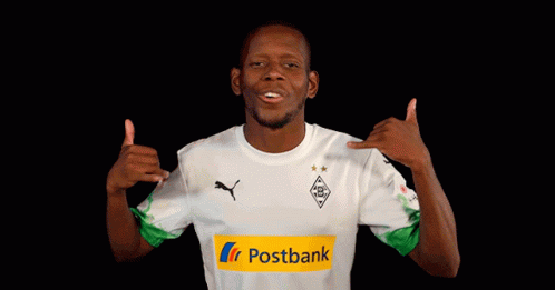 Man in White Shirt with Postbank Logo