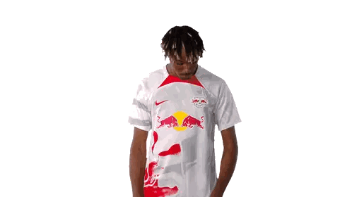 Man in White Shirt with Red Bull