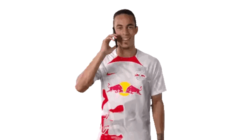 Man in White Shirt with Red Bulls