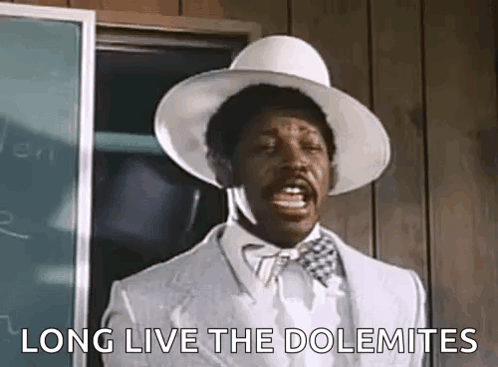 Man In White Suit And Hat Shouting At Blackboard GIF