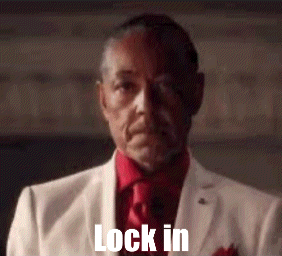 Man in White Suit and Red Tie Saying Lock In