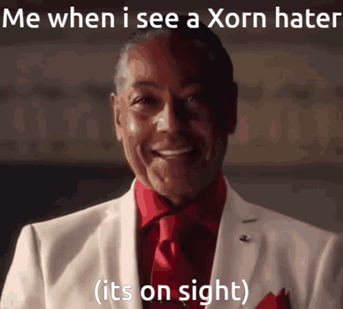 Man In White Suit And Red Tie Smiling Me When I See A Korn Hater