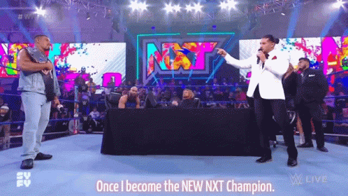 Man In White Suit Holding Trophy GIF