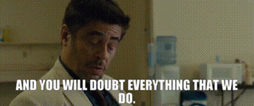 Man in White Suit Saying And You Will Doubt Everything That We Do
