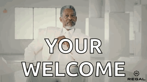Man in White Suit Saying You Welcome