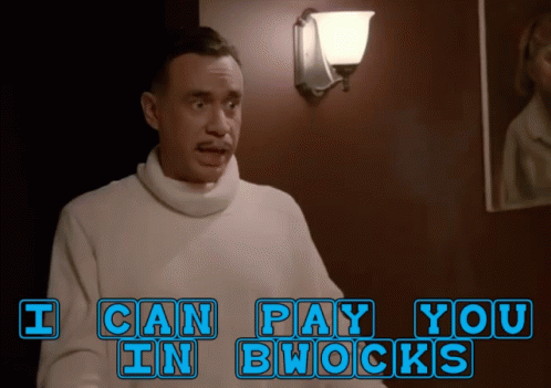 Man in White Sweater Saying I Can Pay You in Brock