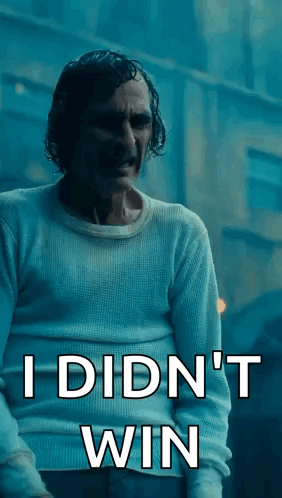 Man in White Sweater Saying I Didn't Win