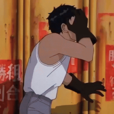 Man In White Tank Top And Black Gloves Covering Face GIF
