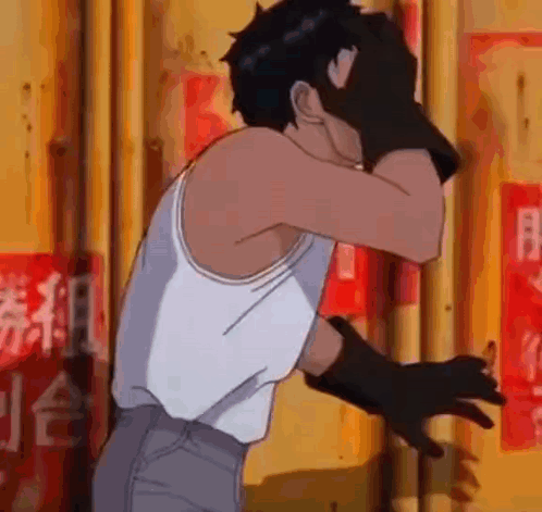 Man In White Tank Top And Black Gloves Covering Face GIF