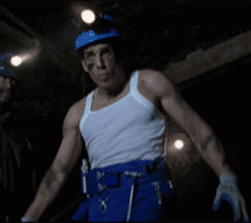 Man in White Tank Top and Blue Hard Hat