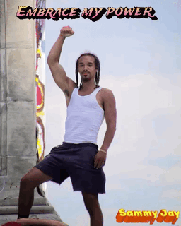 Man in White Tank Top and Blue Shorts