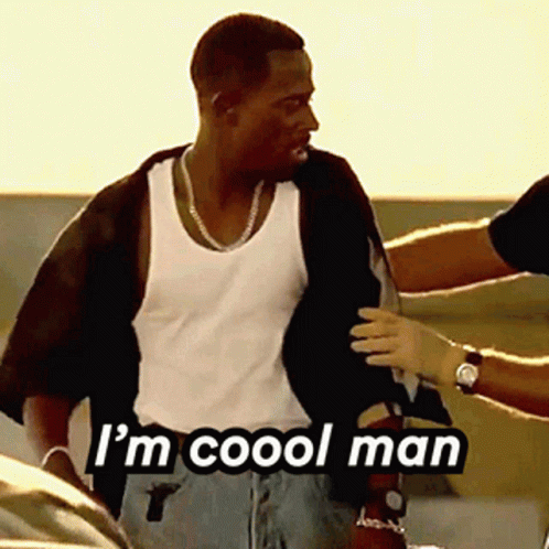 Man in White Tank Top Being Helped by Another Man Saying I'm Cool Man