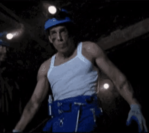 Man in White Tank Top, Blue Pants, Blue Hard Hat