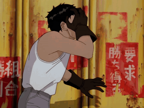 Man In White Tank Top Covering Face Before Yellow Wall With Chinese Writing GIF