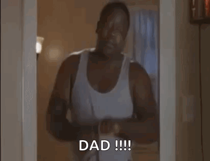 Man In White Tank Top Saying Dad GIF
