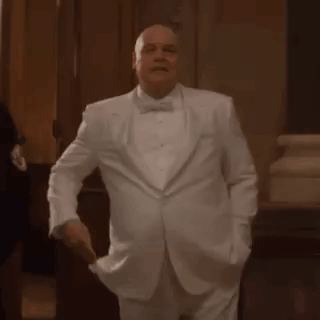 Man in White Tuxedo and Bow Tie