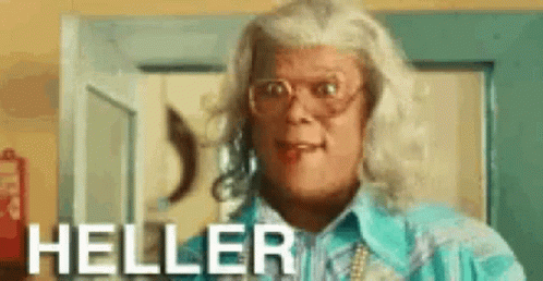 Man In Wig And Glasses At Door With Heller GIF