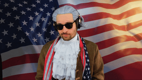 Man in Wig and Headphones Before American Flag