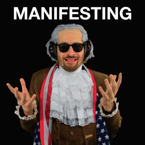 Man in Wig and Headphones Saying Manifesting