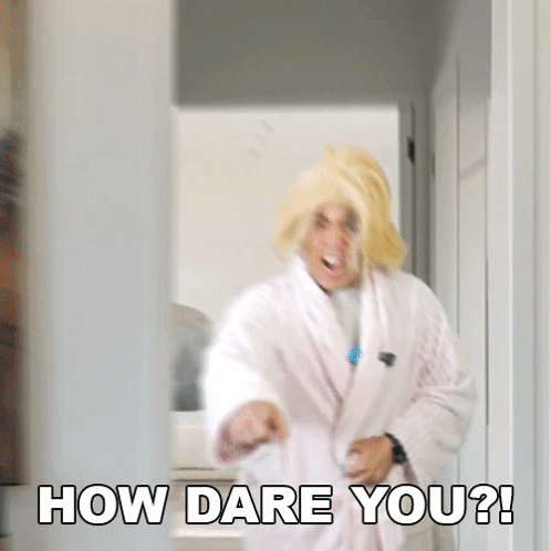 Man in Wig and Robe Asking How Dare You