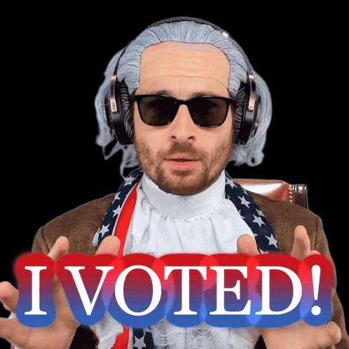 Man in Wig and Sunglasses Holding I Voted Sign