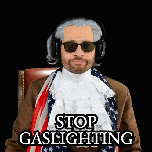 Man in Wig and Sunglasses Saying Stop Gaslighting