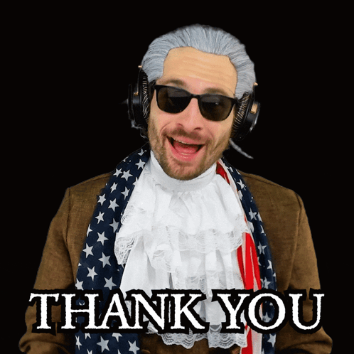 Man in Wig and Sunglasses Says Thank You