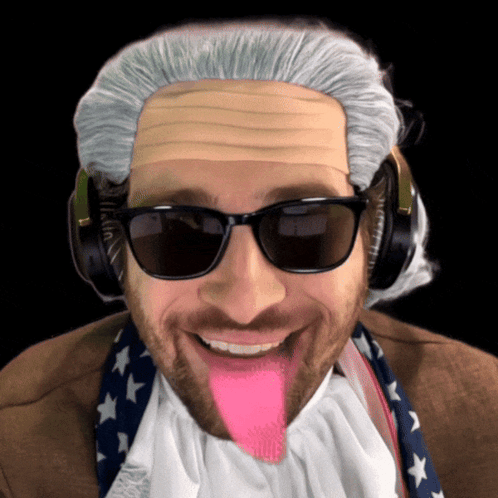 Man in Wig and Sunglasses Sticking Out Pink Tongue