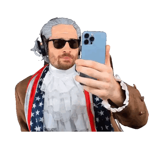 Man in Wig and Sunglasses Taking Selfie