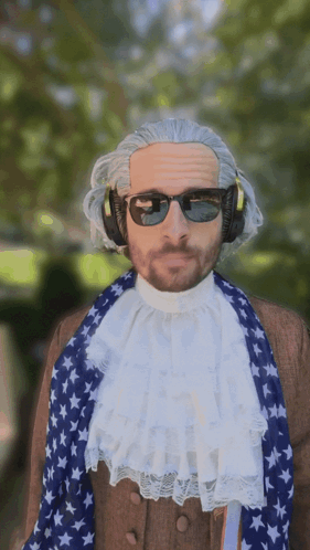 Man in Wig and Sunglasses With American Flag Scarf