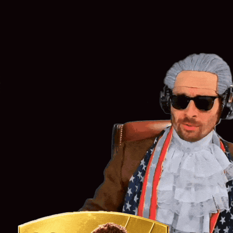 Man in Wig and Sunglasses with Card Number 99