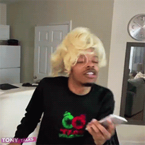 Man in Wig and Tony Talk Shirt
